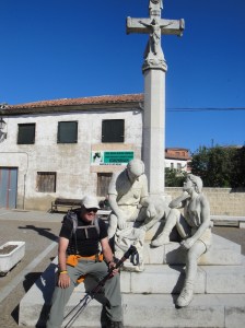 A modern statue paying homage to weary pilgrims on the Camino.
