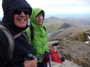 Carl taking a picture of Joe, Nancy and Marion at the summit!